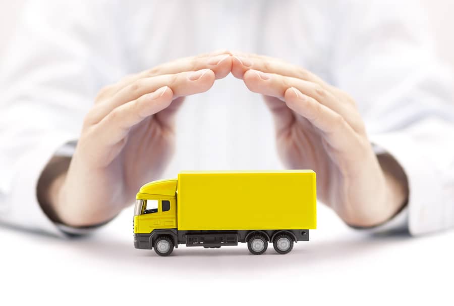 bigstock-Car-insurance-Yellow-truck-mi-270035233